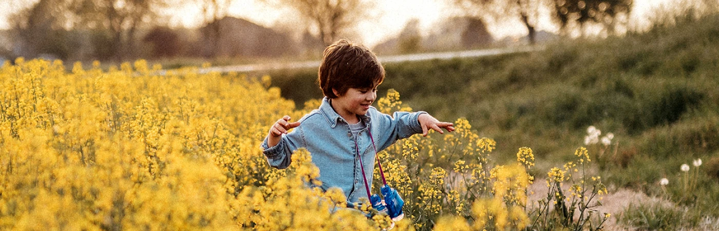 child-in-yellow-grass