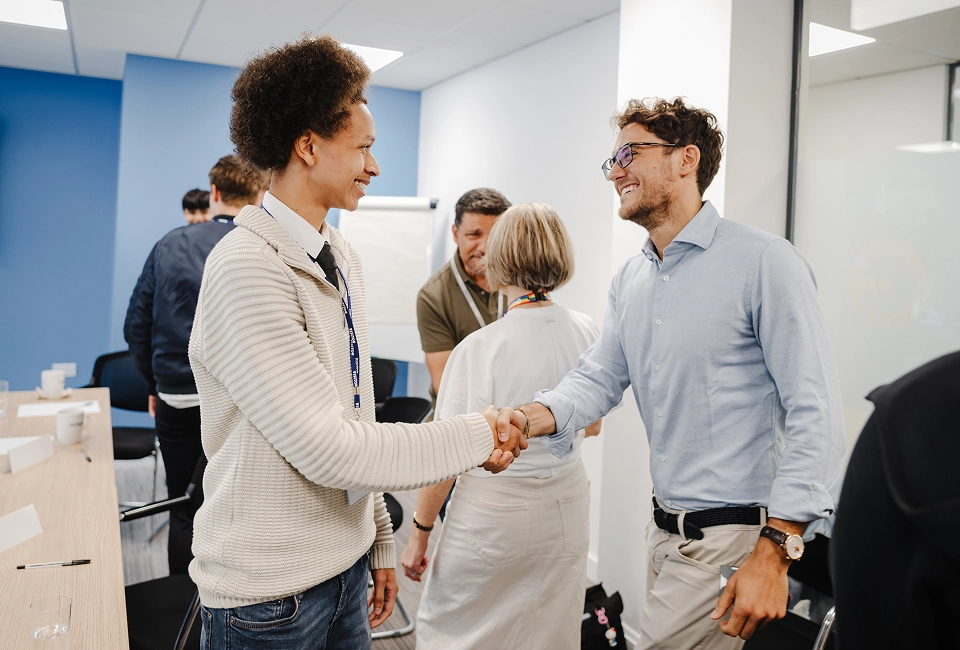 collegues-at-work-shaking-hands
