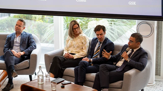 employees-speaking-at-conference